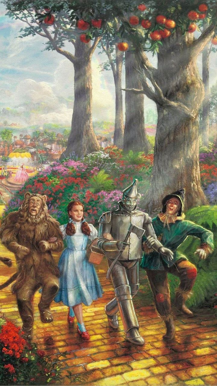 the wizard and his friends are walking through the park together, with an apple tree in the