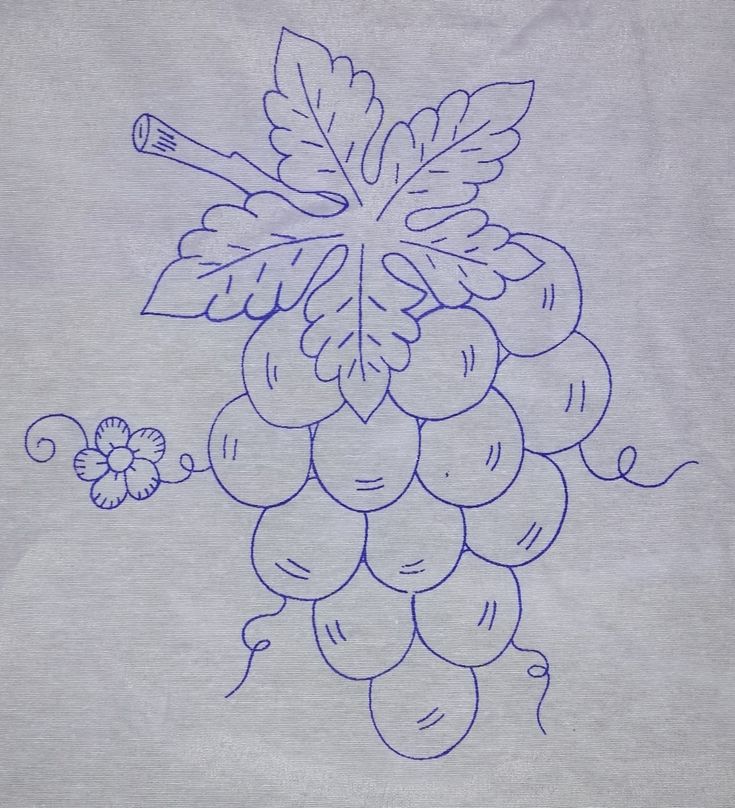 a drawing of a bunch of grapes with leaves on it and a flower in the middle