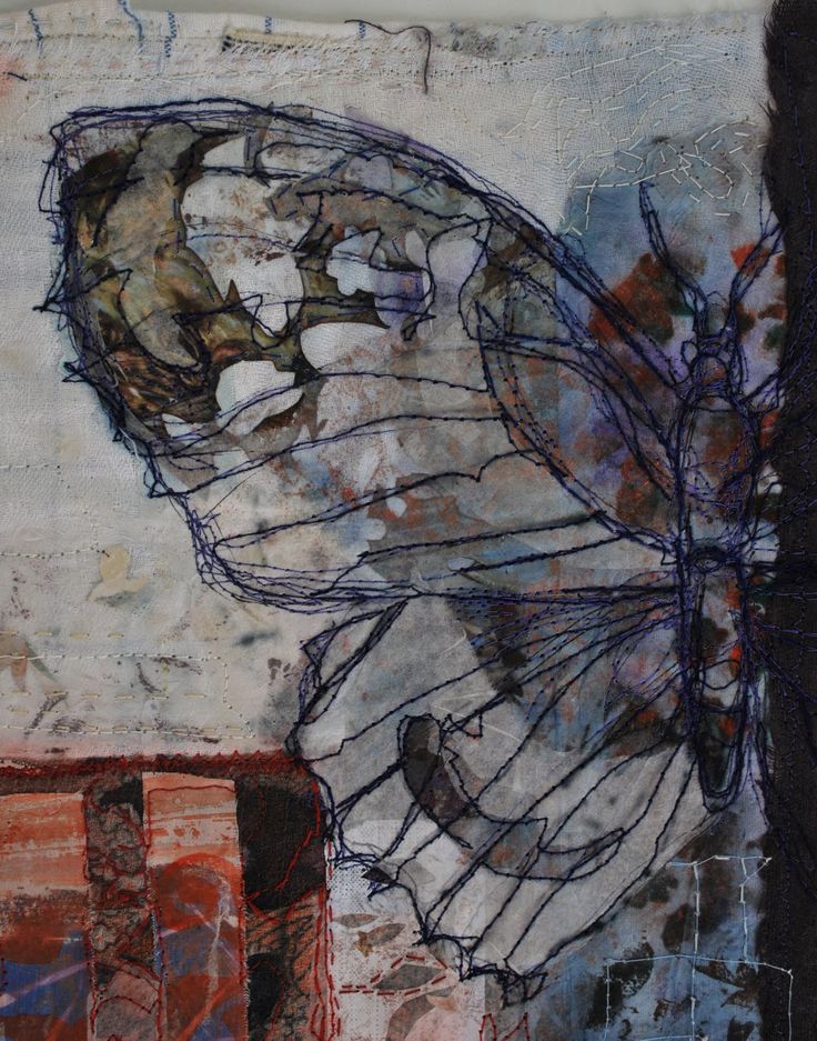 an abstract painting of a butterfly on a wall