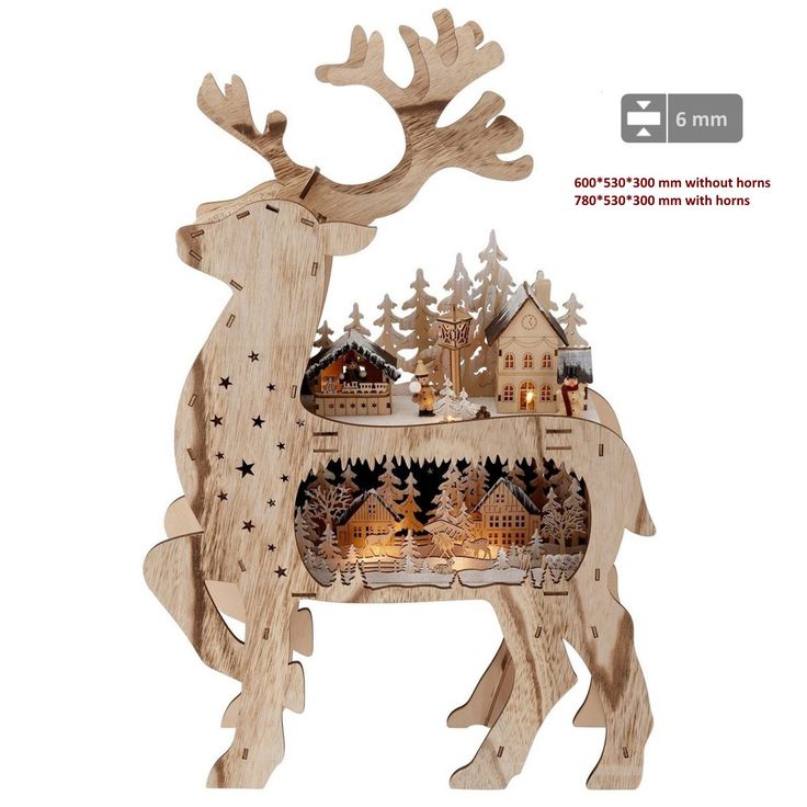 a wooden reindeer with houses and trees on it