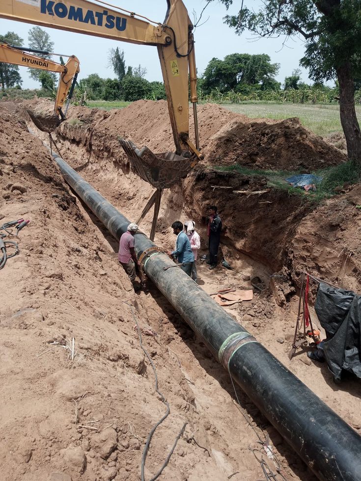 workers are working on the construction of a pipeline