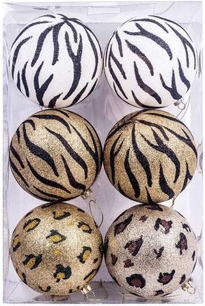 six zebra print christmas ornaments in a package