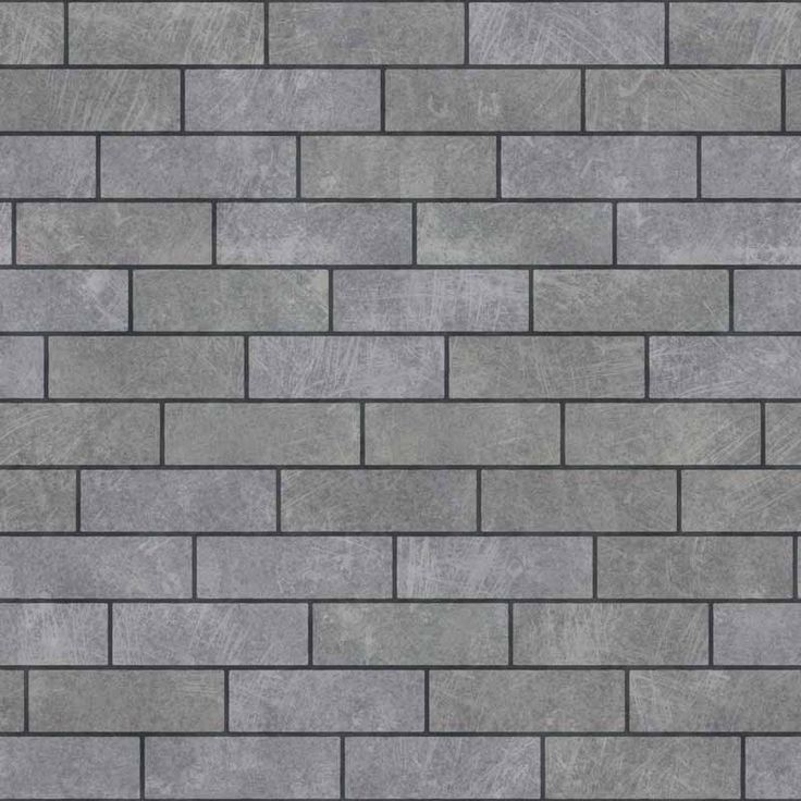 a gray brick wall textured with cement