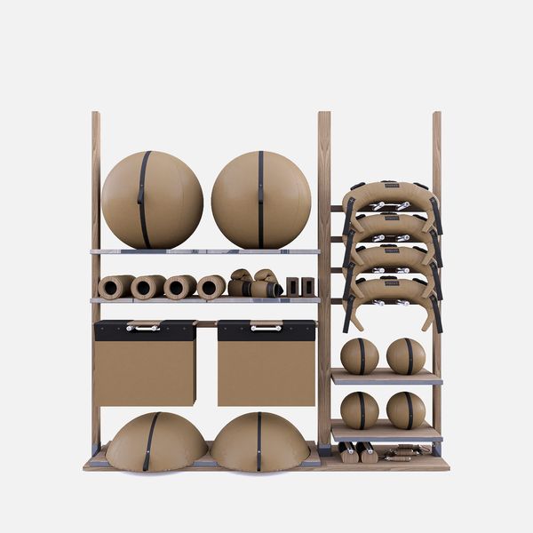 a shelf with basketballs and other sports equipment on it's shelves, all stacked up against each other