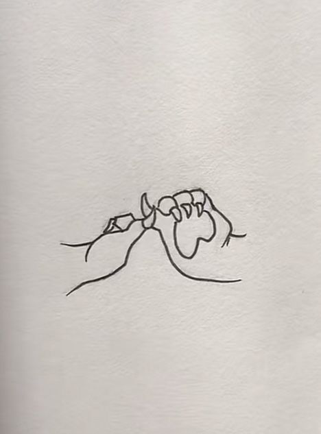 a drawing of a hand holding something in it's left arm with the other hand