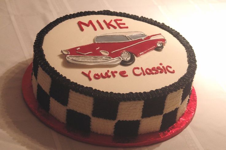 a cake that is decorated to look like a checkered car with the words mike you're classic on it