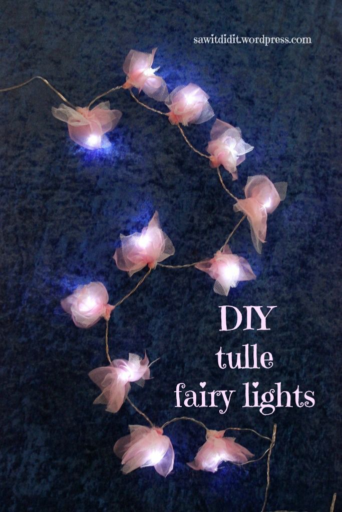 the words diy tulle fairy lights are lit up