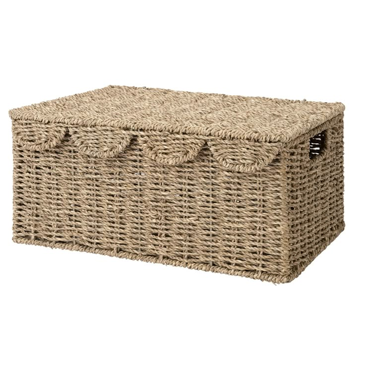 a large wicker storage box with handles on the top and bottom, shown from the side