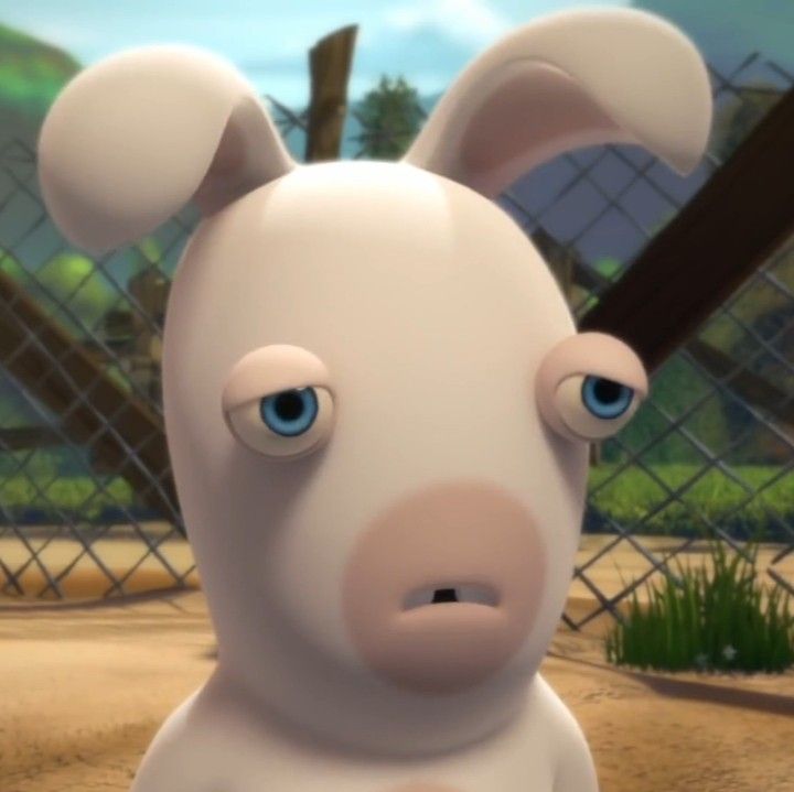 an animated animal with blue eyes and ears standing in front of a chain link fence