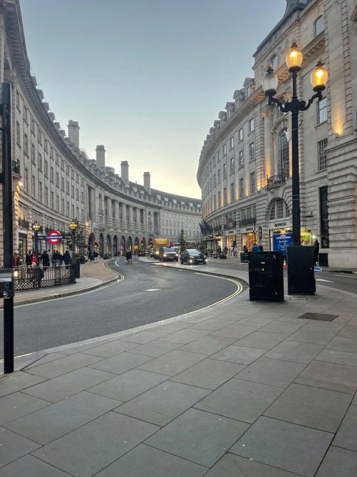 an empty street in the middle of a city