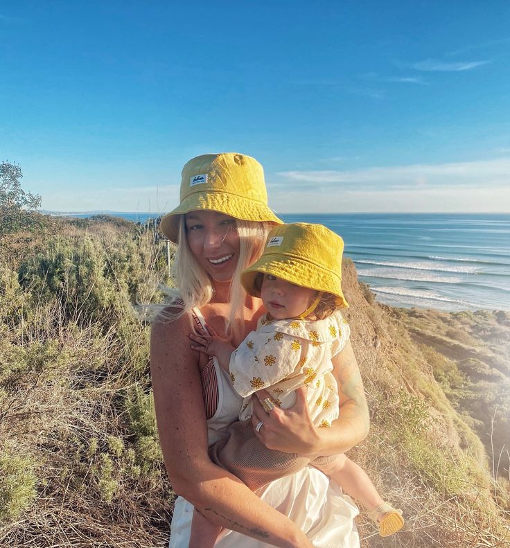 "The perfect weekend bucket hat! Made from a bright yellow linen blend fabric. This hat is very comfortable to wear. A great sun hat for women or men. I made this hat with a day of adventure in mind, somewhere sunny and wild! For baby or kid version of this hat, see link below. This hat is made from a yellow linen and cotton blend fabric.  Inside liner is white cotton. Interfacing inside brim for extra shape.  Brim measures approx. 2.5\" wide. Crown measures approx. 3.5\" deep. Available in size Yellow Outdoor Hat With Curved Brim, Yellow Curved Brim Hat For Outdoor, Yellow Beach Bucket Hat, Casual Yellow Wide Brim Hat, Yellow Summer Sun Hat For Outdoor, Yellow Summer Hat For Outdoor, Yellow Summer Hats For Outdoor, Yellow Bucket Hat For Outdoor Summer Activities, Yellow Sun Hat With Short Brim For Summer