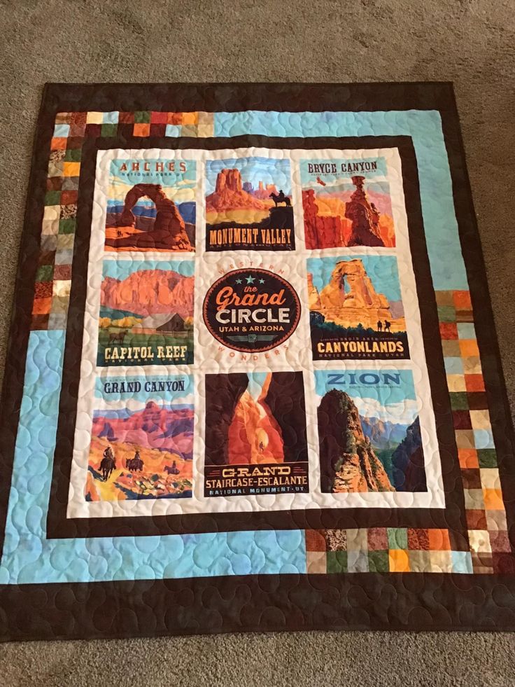 a quilt made to look like it has pictures on it and the words grand circle written in different languages