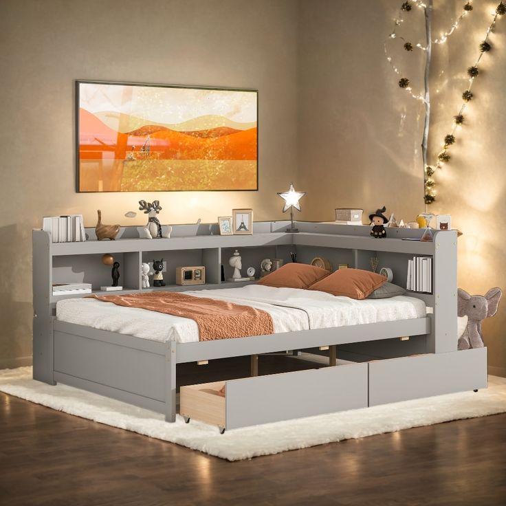 a bed with drawers underneath it in a room