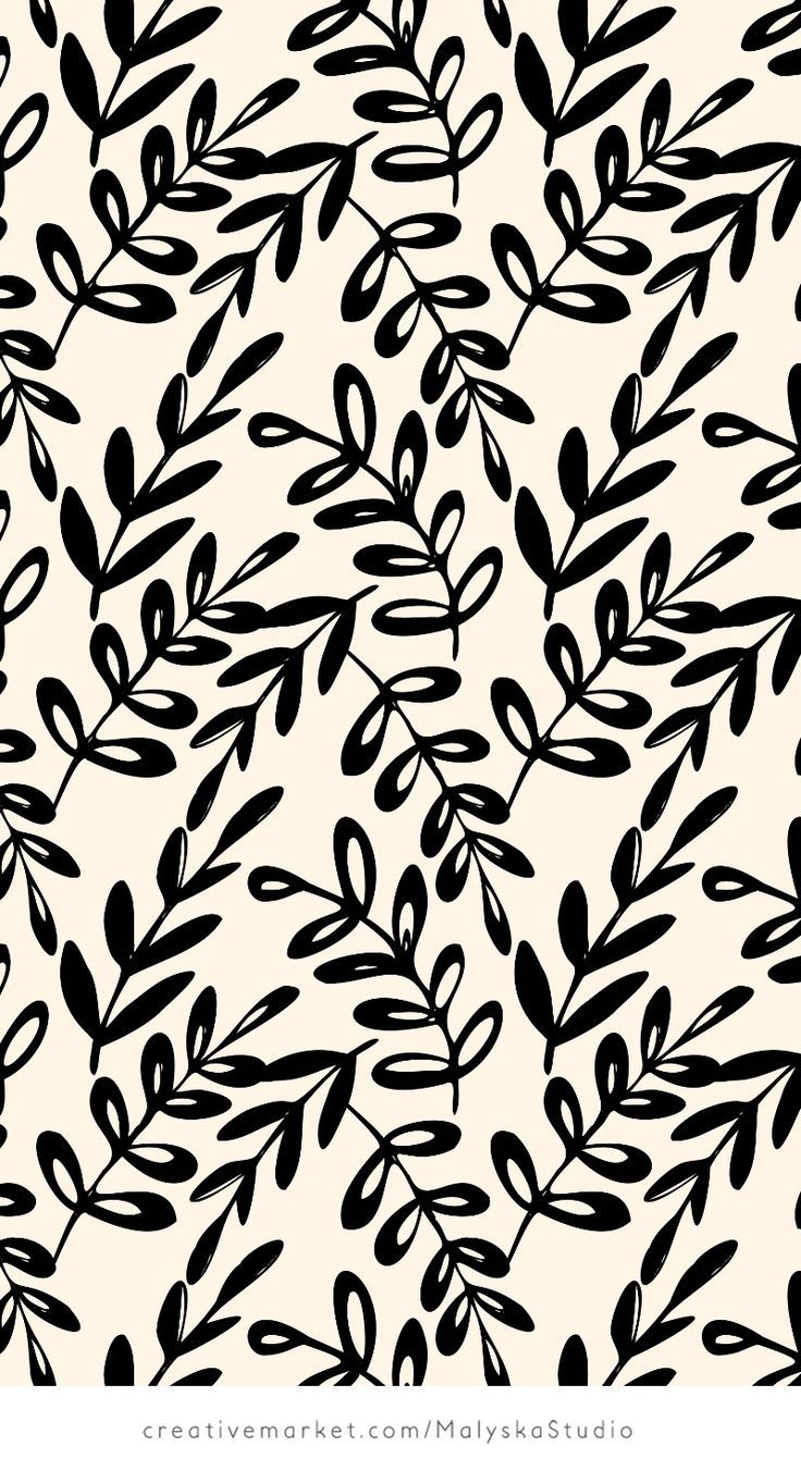 black and white leaves on a beige background