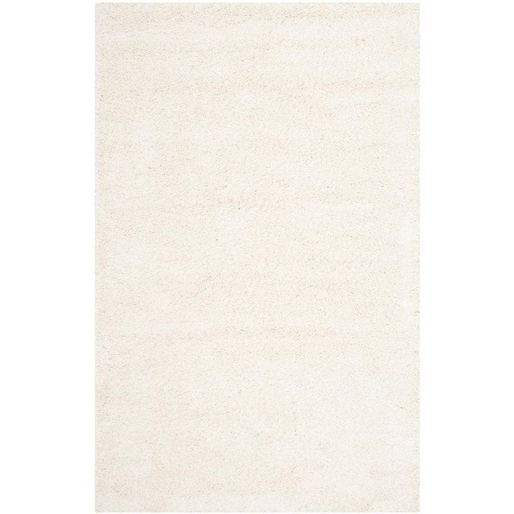 a white rug on a white background with no one in the room to see it