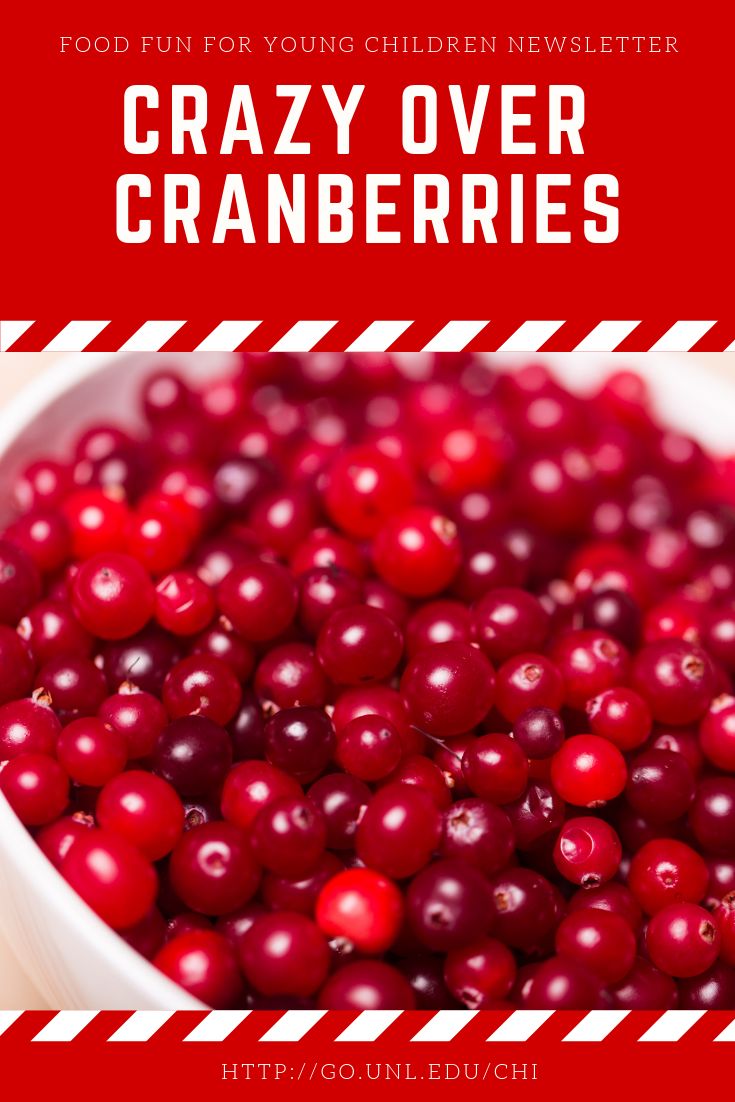 cranberries in a white bowl with text overlay that reads, food fun for young children newsette crazy over cranberries