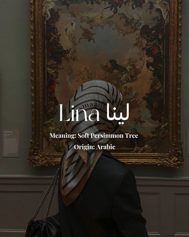 a woman wearing a black jacket and white scarf in front of a painting with the words, i linea u meaning soft persimmon tree origin arabic