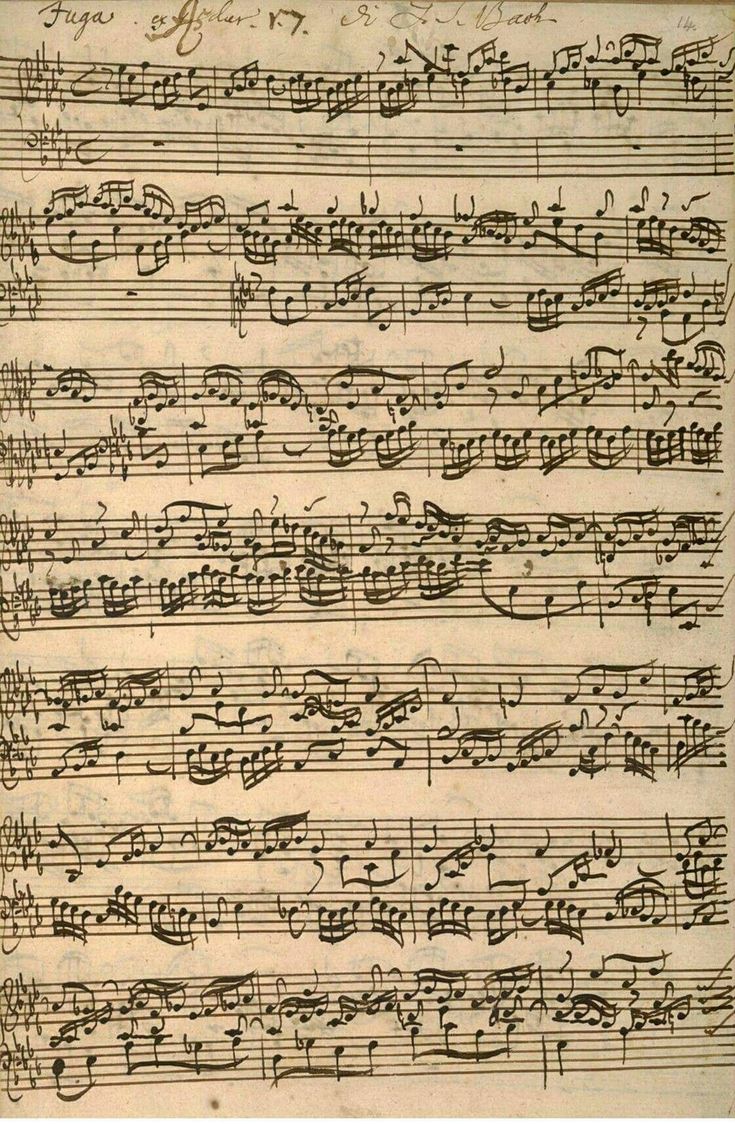 an old sheet with music notes on it