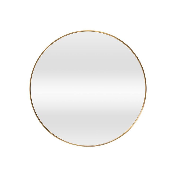 a round mirror on a white wall with gold trim around the edges and bottom edge