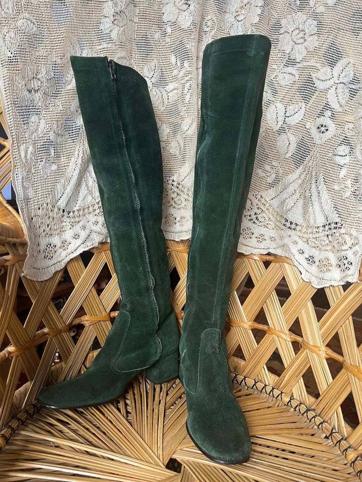 Beautiful and rare vintage late 60s to early 70s suede boots in rare forest green colour. Saks Fifth Avenue label. Calf-hugging fitted shape which come up just over the knee and dip down at the back very similar to Biba boots of this era.  Two-inch block heels which are squared off at the back. The chunky metal full length zips open almost right down to the sole. Size: Marked 6.5 M. Fit like a modern UK5 and do have a very narrow fit on the calves. PLEASE check measurements carefully, as follows: Length of insole following the curve: approx. 10 inches (25.5cm) Width of insole (widest part of sole at the ball of the foot): approx 3 inches (8cm) Height of heel at the back: approx. 2 inches (5cm) Width of vamp (over the top of the foot at the highest part before your leg) 9 inches (23cm) Ankl Thrift Manifestation, 70s Boots, Blue Suede Boots, Barefoot Boots, Vegan Leather Boots, Suede Chukka Boots, Otk Boots, Daisy Jones, Summer Boots