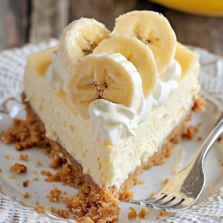 a slice of cheesecake with bananas on top