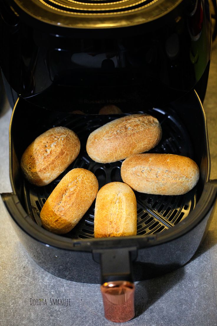 bread is being cooked in an air fryer