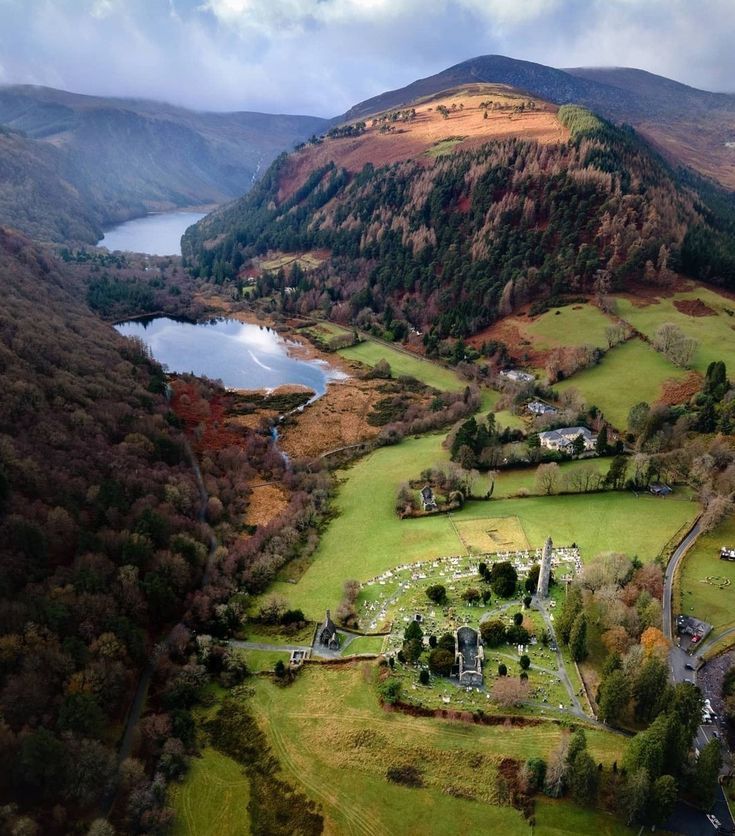 an aerial view of the countryside and lake