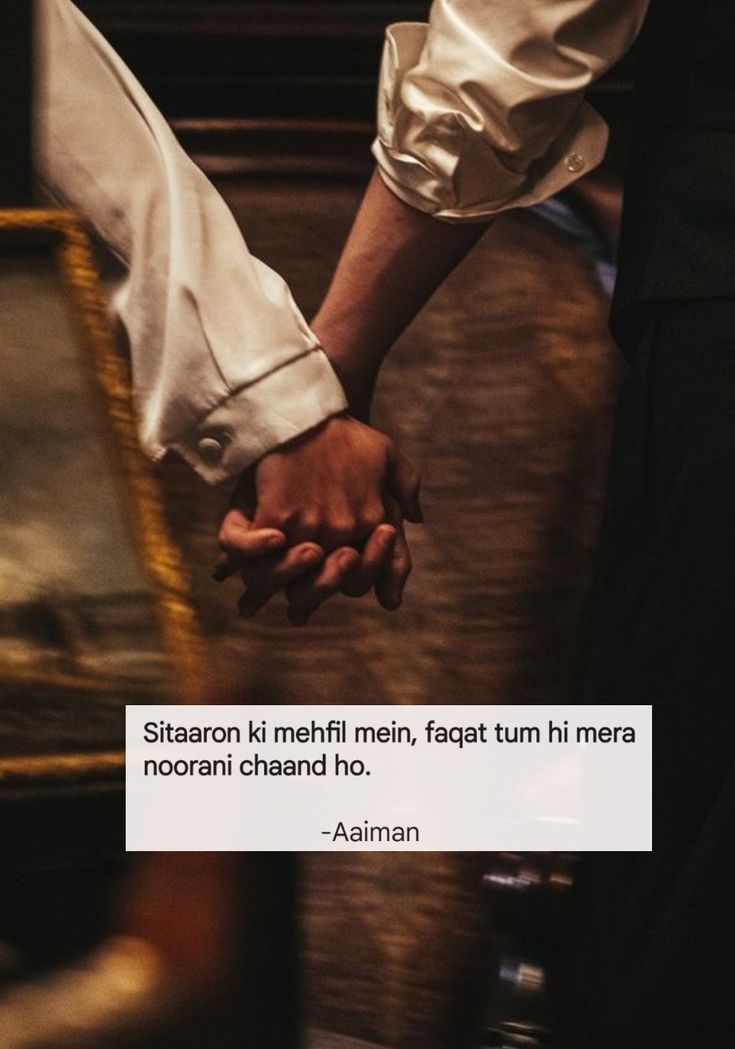 two people holding hands with a quote about love