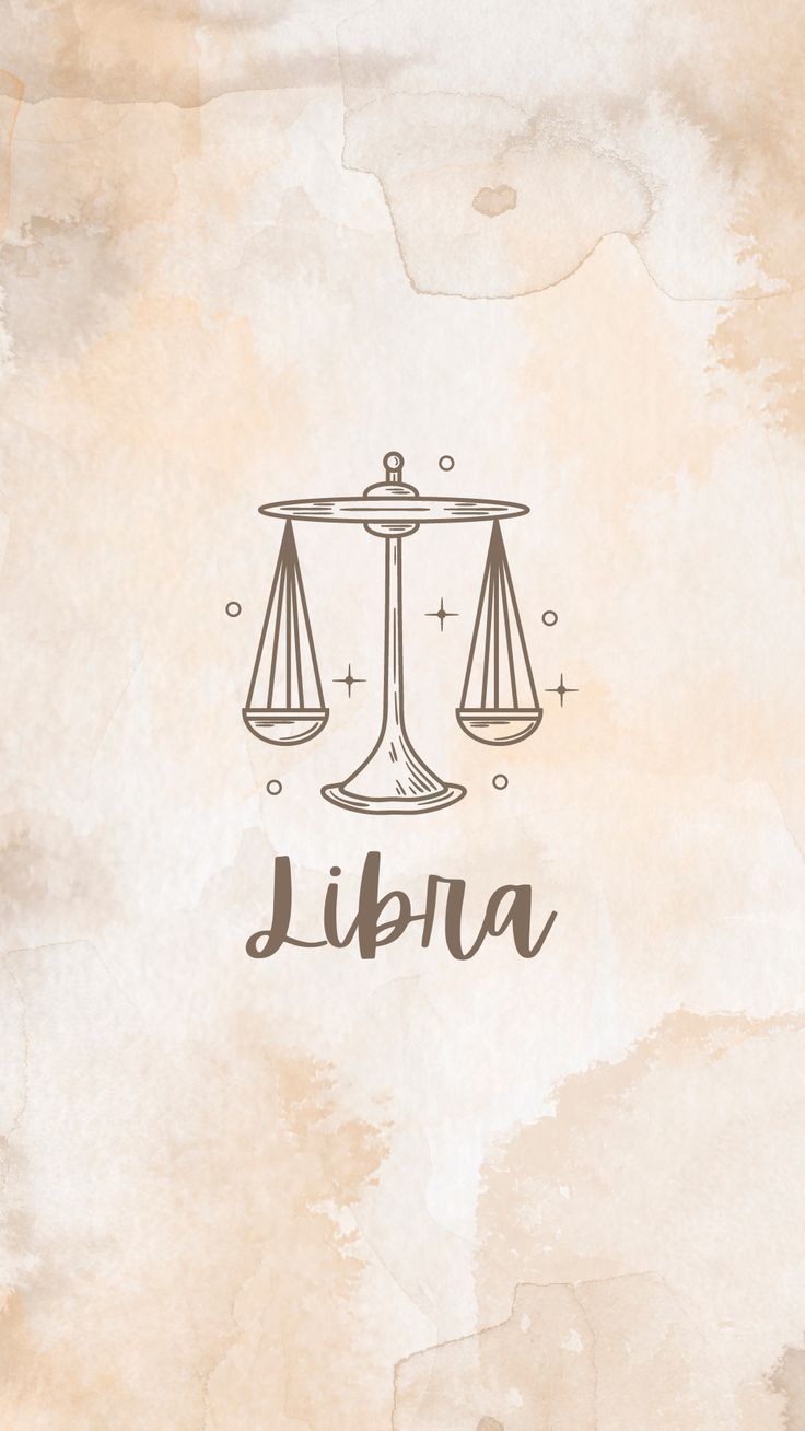 the libra symbol is drawn on top of an old paper