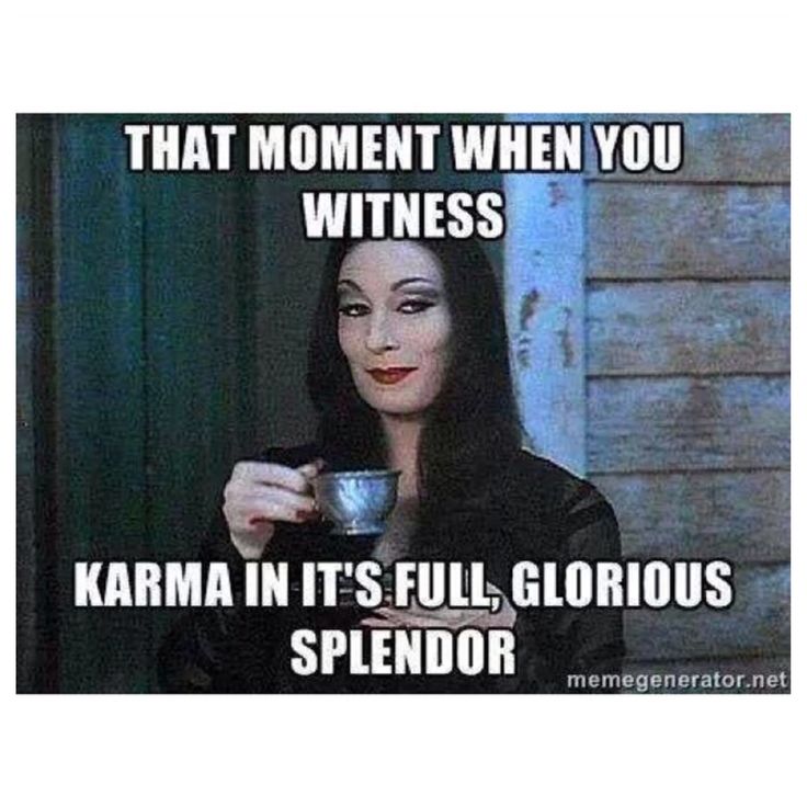 a woman holding a cup with the caption that moment when you witnesses witches karma in its full glorious splendor