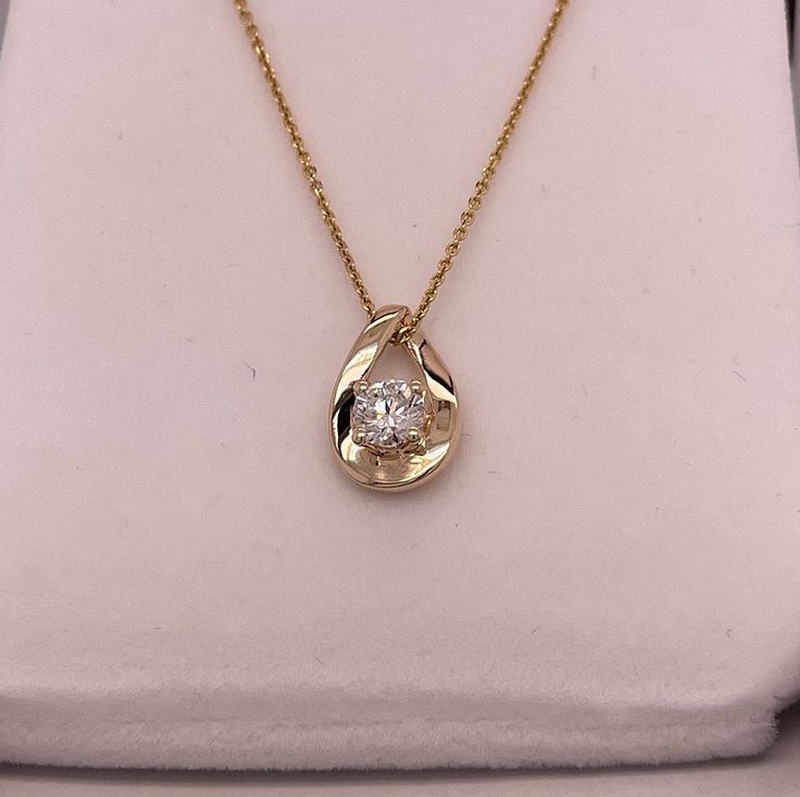 14kt yellow gold modern style pendant holds a .51ct VS E_F color lab grown diamond in a solid contemporary 4 prong setting. 14.5mm tall by 9.4mm wide. Chain not included. 1.8g Pendent Set Gold, Pendent Set, Solitaire Diamond Pendant, Diamond Pendants Designs, Diamond Pendant Sets, Gold Chain Design, Diamond Pendants, Color Lab, Bangle Ring