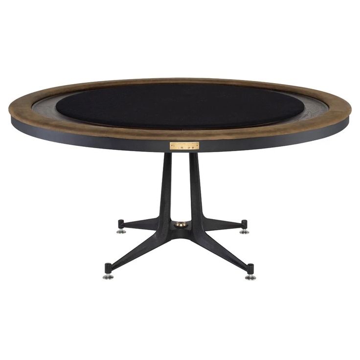 a round table with black top and metal legs, on an iron base in front of a white background