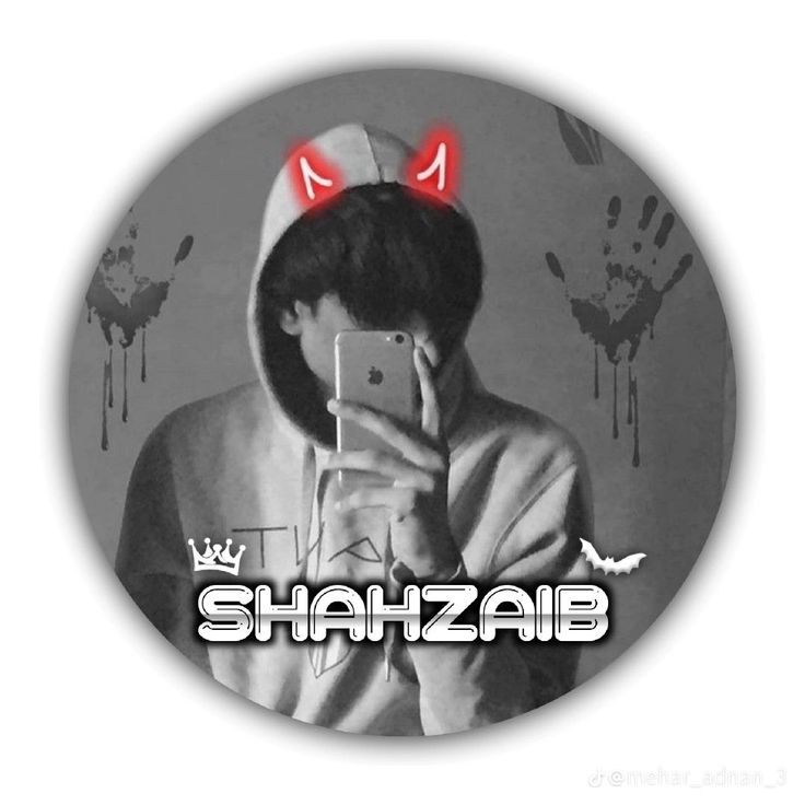 a person taking a selfie in front of a mirror with the word shazaib on it