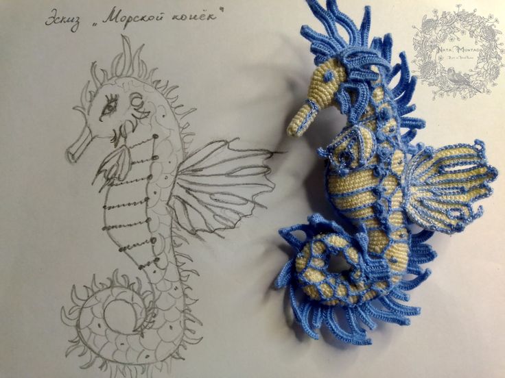 two handmade seahorses are sitting next to each other