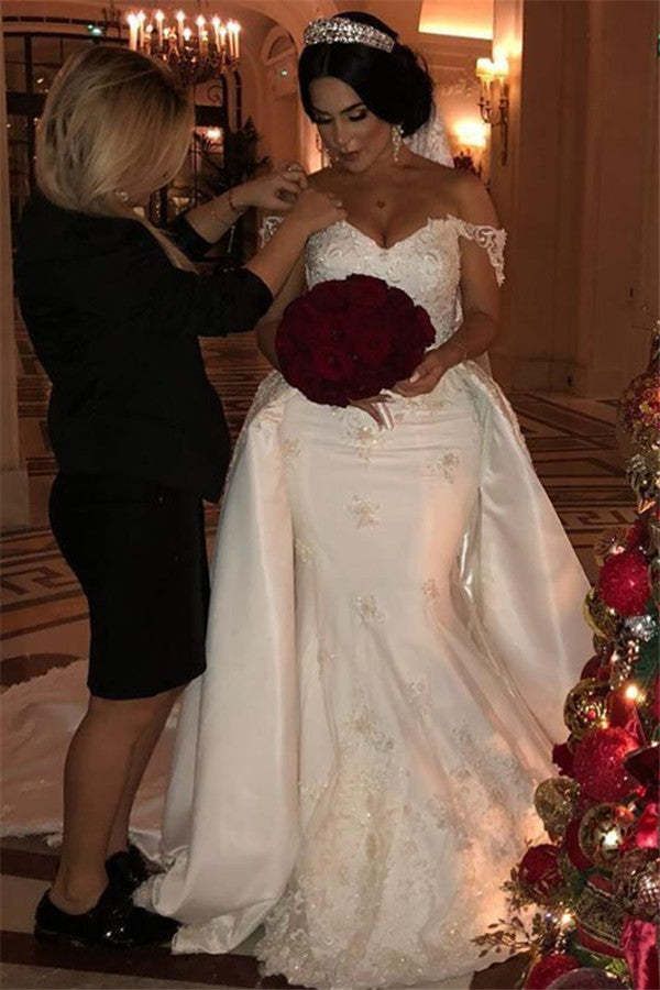 the bride is getting ready for her big day at the wedding ceremony with her mother