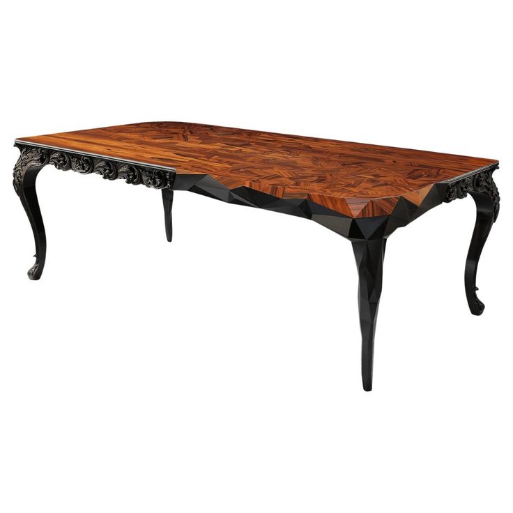 a wooden table with black legs and an intricate design on the top, against a white background