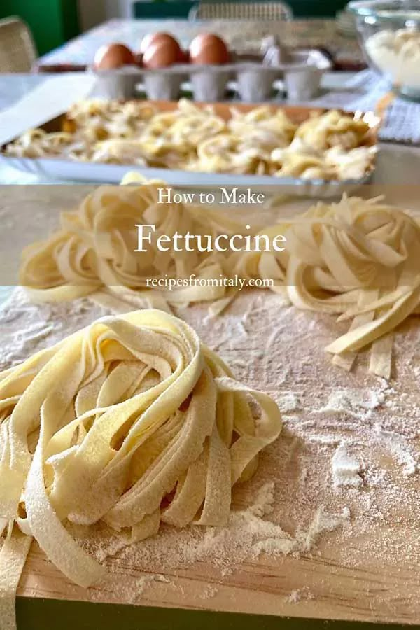 homemade fettuccine on a wooden cutting board with eggs in the background and text overlay that reads how to make fettuccine