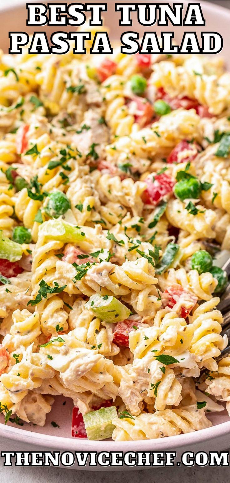 this pasta salad is loaded with tuna and vegetables