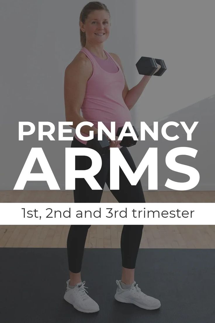 a woman is holding a dumbbell while standing on a mat with the words pregancy arms