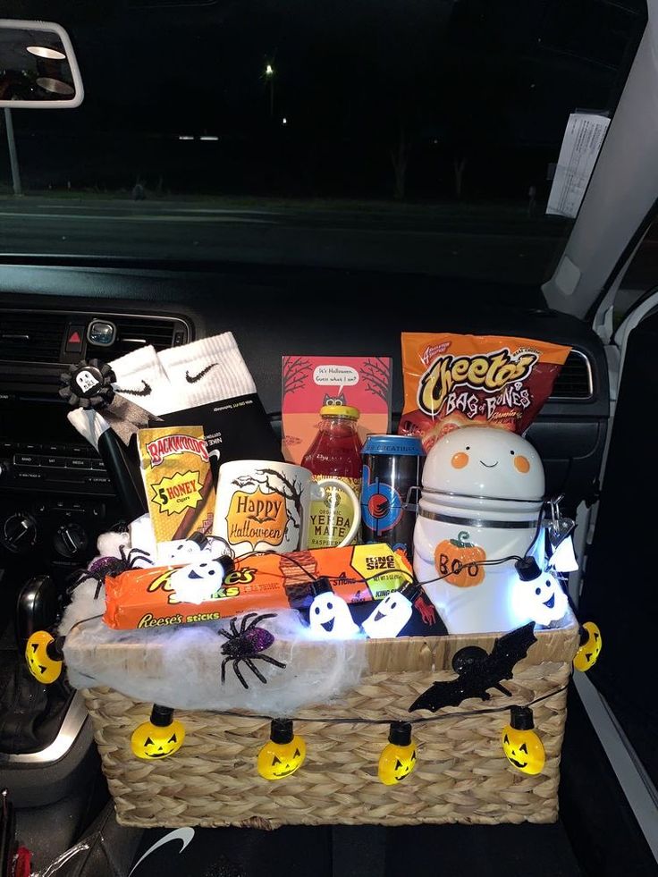 a car trunk filled with halloween treats and candy