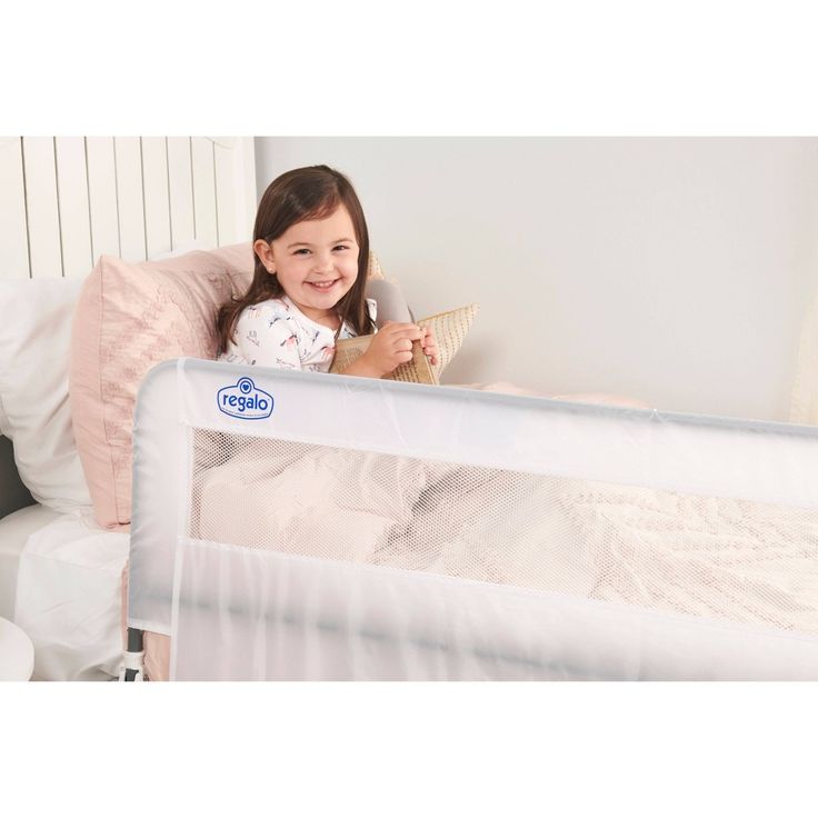 If you would label your toddler as a “wild sleeper”, give the Regalo HideAway Extra Long Bed Rail a try. It is an ideal solution for children who need a little extra protection from rolling out of bed. The all-steel bed rails measure 20” high so they can easily accommodate thick mattresses and extend an impressive 54” to provide the utmost coverage of the bed. Bed rails for toddlers can be an eye sore, so we’ve implemented our patented Glide Trac System. It allows the rail to tuck under the matt Bed Guard Rails, Safety Bed, Hideaway Bed, Bed Rails For Toddlers, Rail Guard, Bed Rail, Steel Bed, Long Bed, Queen Mattress Size