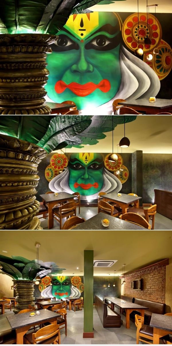 the inside of a restaurant with colorful paintings on the walls