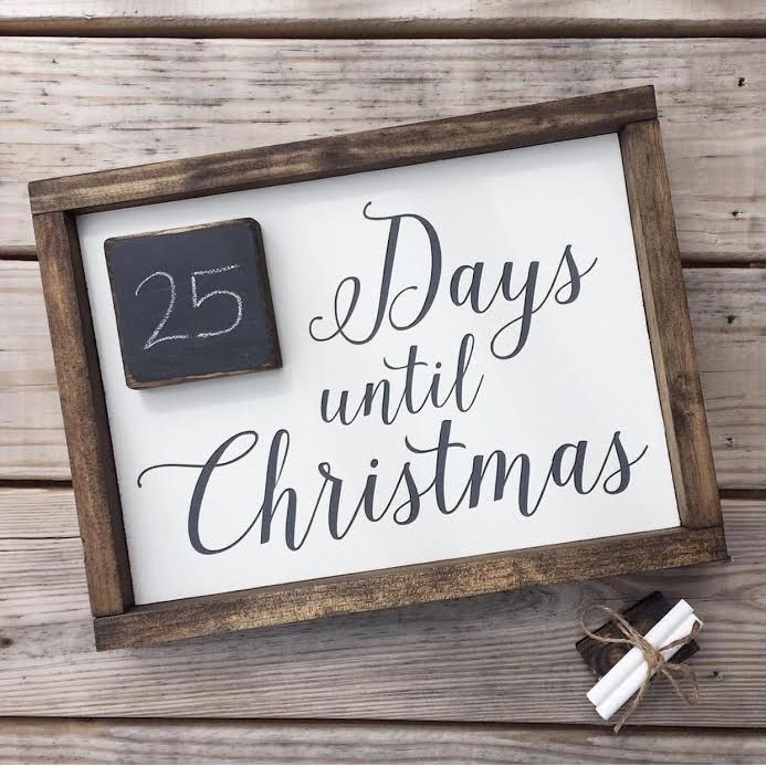 a wooden sign that says 25 days until christmas