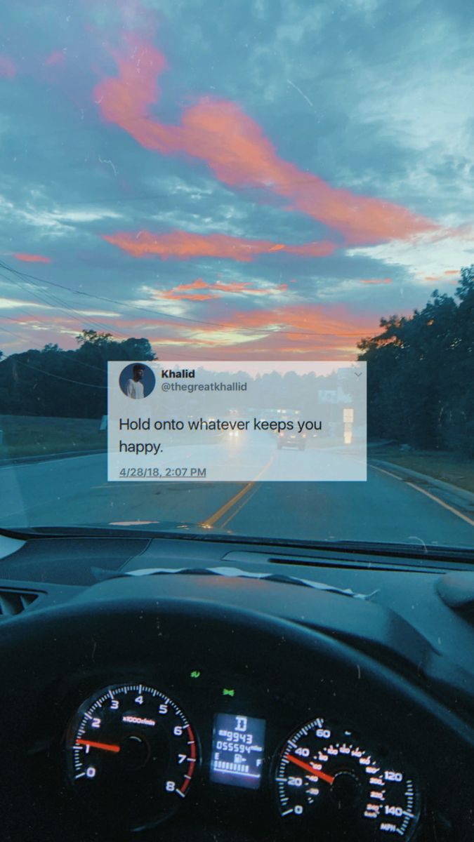 the dashboard of a car with a sign on it that says, hold onto whatever keeps you