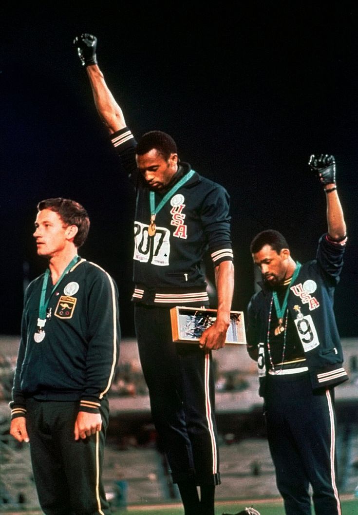 the men's track team celebrates their gold medal