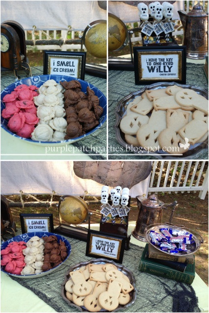 a table topped with lots of different types of cookies and desserts on top of plates