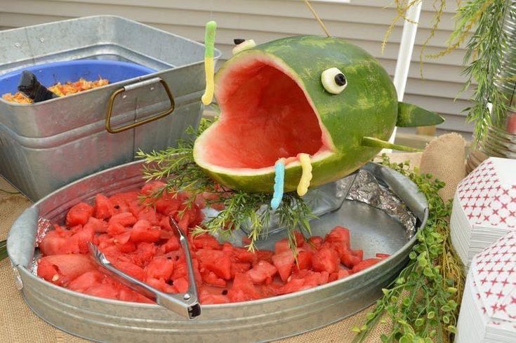 a watermelon shaped like a fish with it's mouth open and teeth out