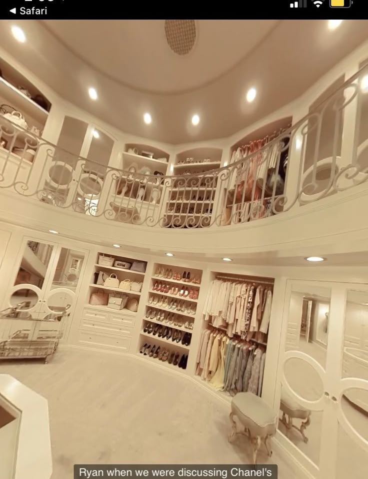 the inside of a closet with lots of clothes