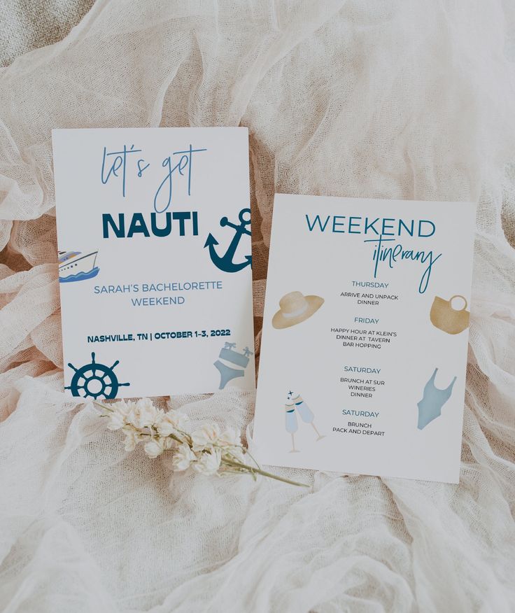 two wedding programs sitting on top of a bed