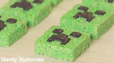 green rice krispy treats with brown sheep on them in the shape of grass blocks